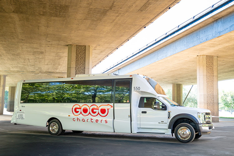 GOGO Charters shuttle bus rental parked on a side street